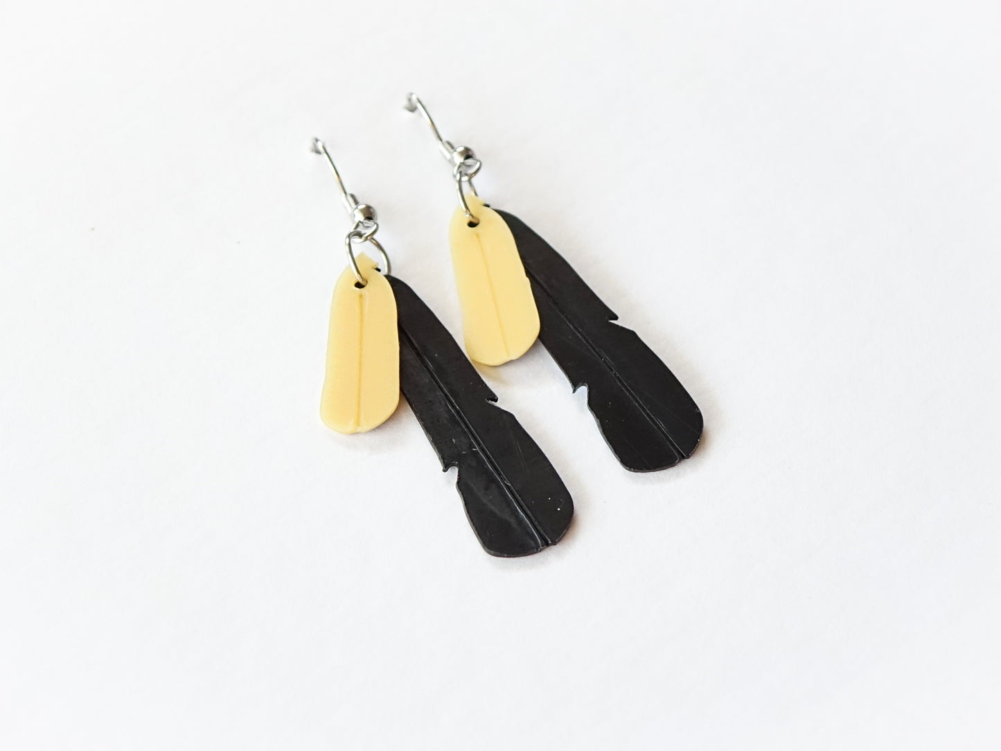 Saddleback Feather Earrings | Recycled Ice Cream Container Lids