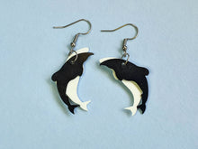 Hector's dolphin earrings laser cut from ice cream container lids by Remix Plastic in Christchurch, NZ